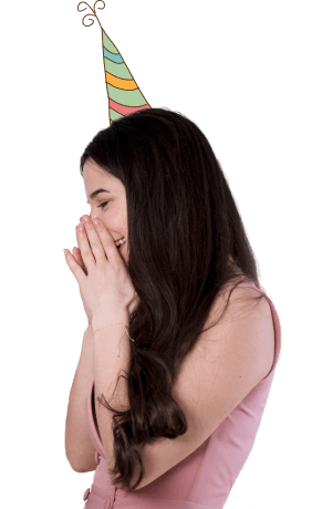 A delighted girl covering her mouth in surprise
